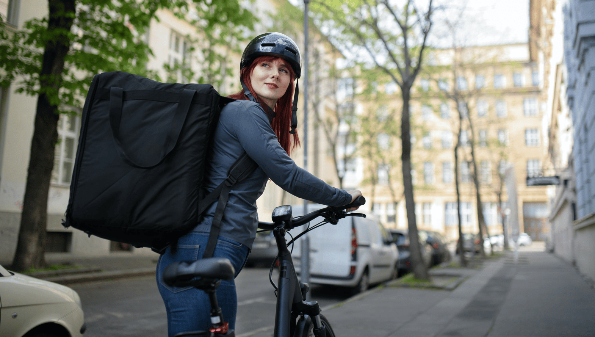 Delivery service woman on bike_medium